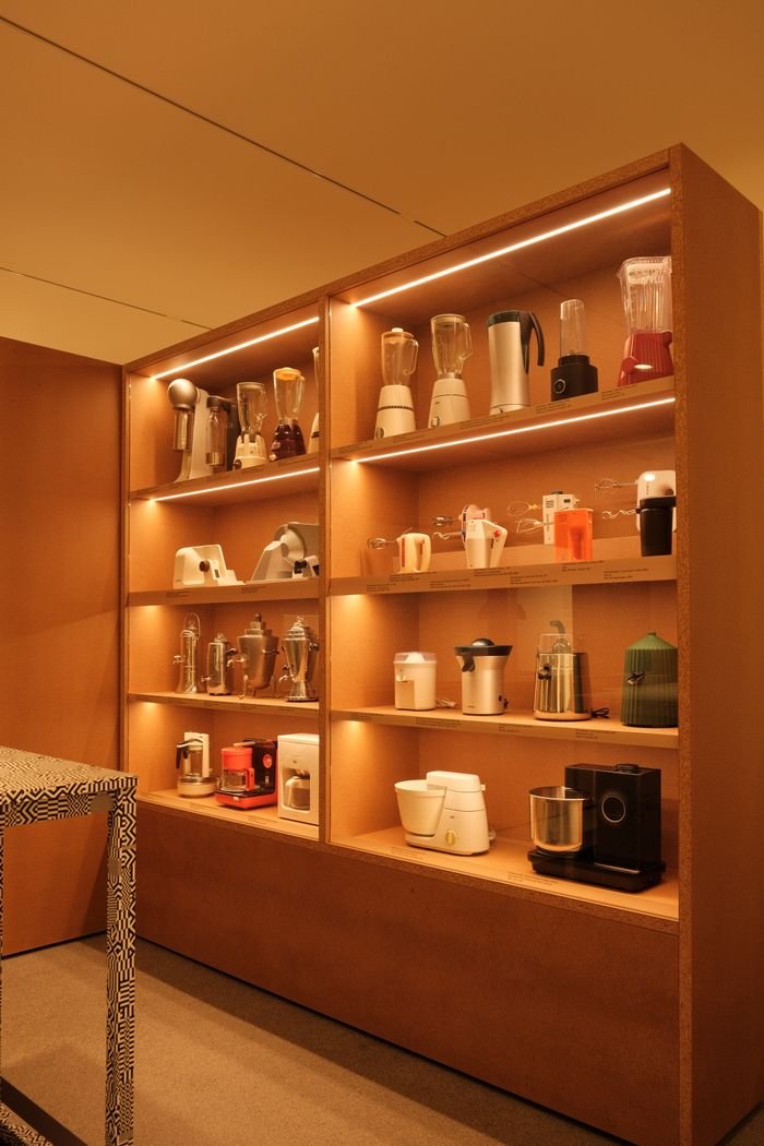 Showcase of modern kitchen appliances in a Munich store, highlighting contemporary design and functionality.